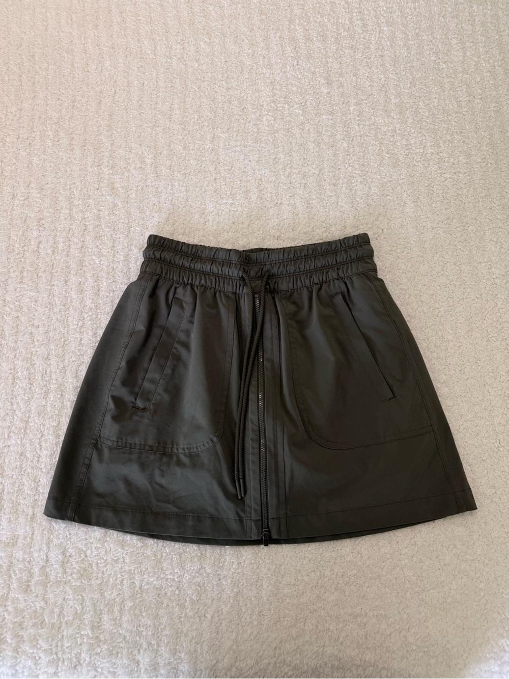 Athleta Black Drawstring A-Line Skort with Front Pockets